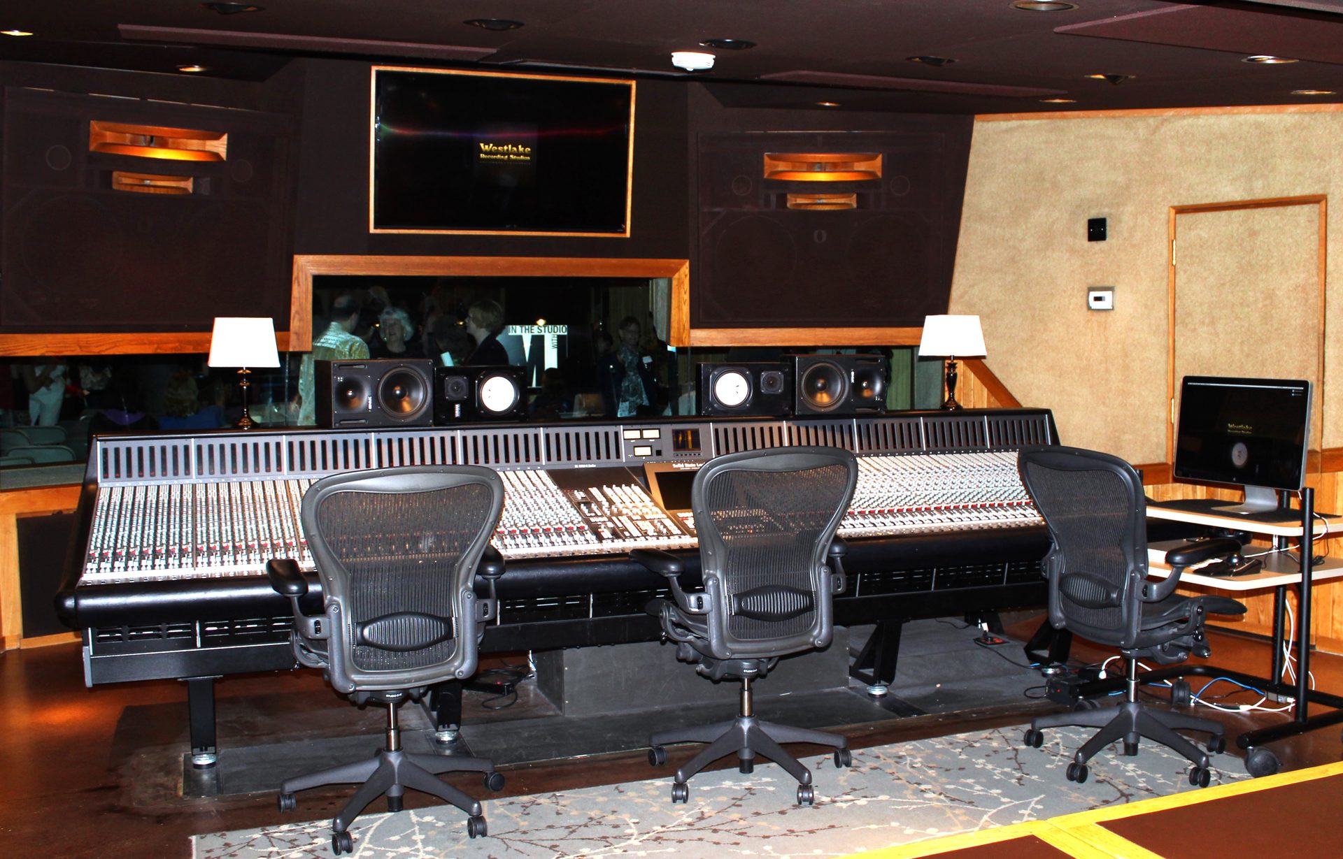 Mixing console in a professional recording studio control room